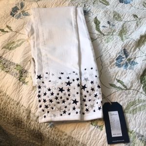 White VV jeans with star pattern